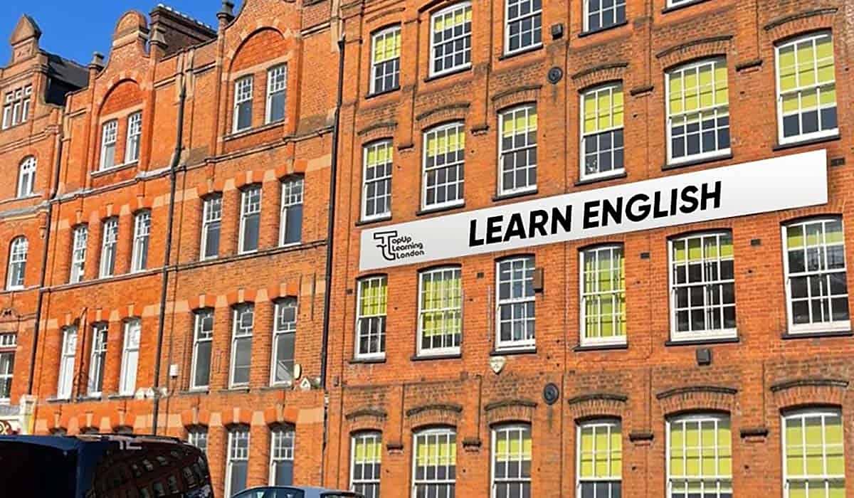 Red-brick building with a Learn English banner at Top Up Learning in London