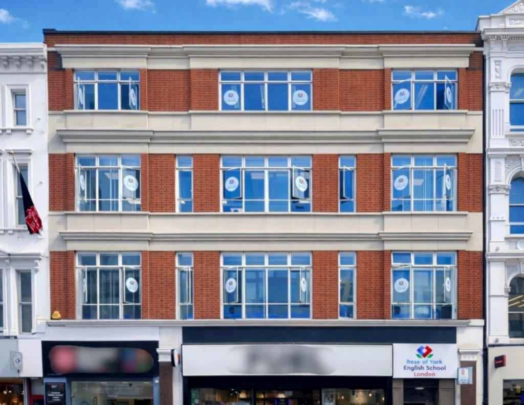 Red-brick building housing Rose of York English School in London