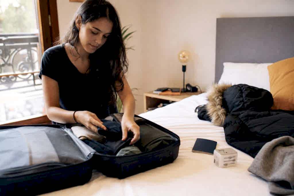 Student packing for a trip to the UK