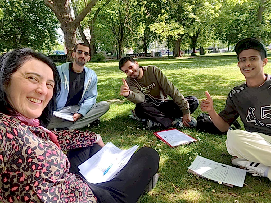 Eurospeak Southampton conversation class sitting on the grass in a park