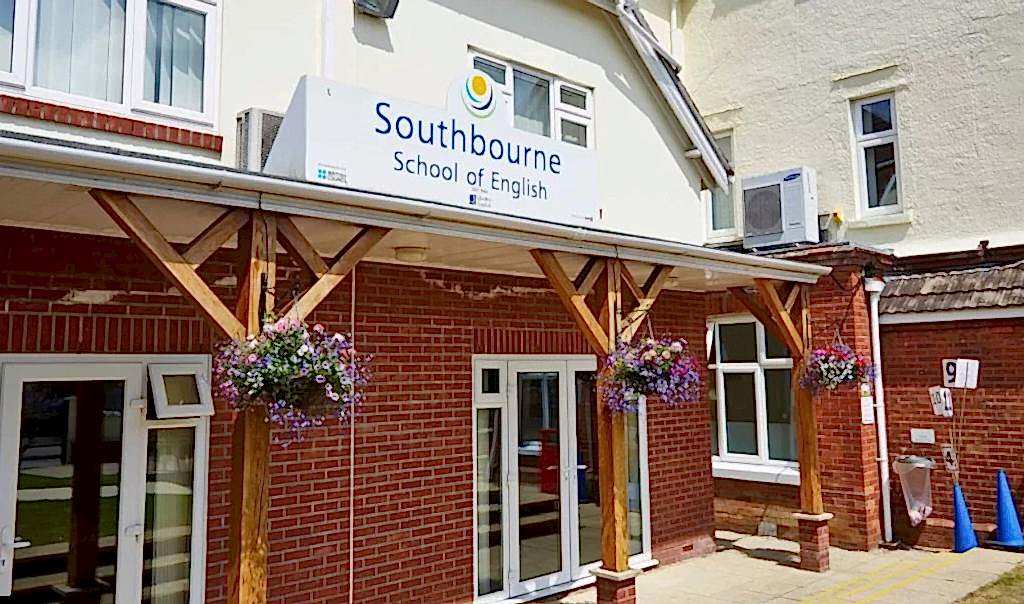 Front entrance of Southbourne School of English with hanging baskets