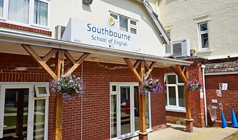 Front entrance of Southbourne School of English with hanging baskets