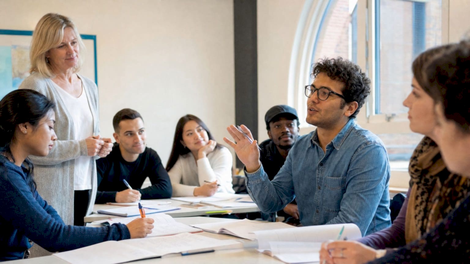 An English class of international students in discussion