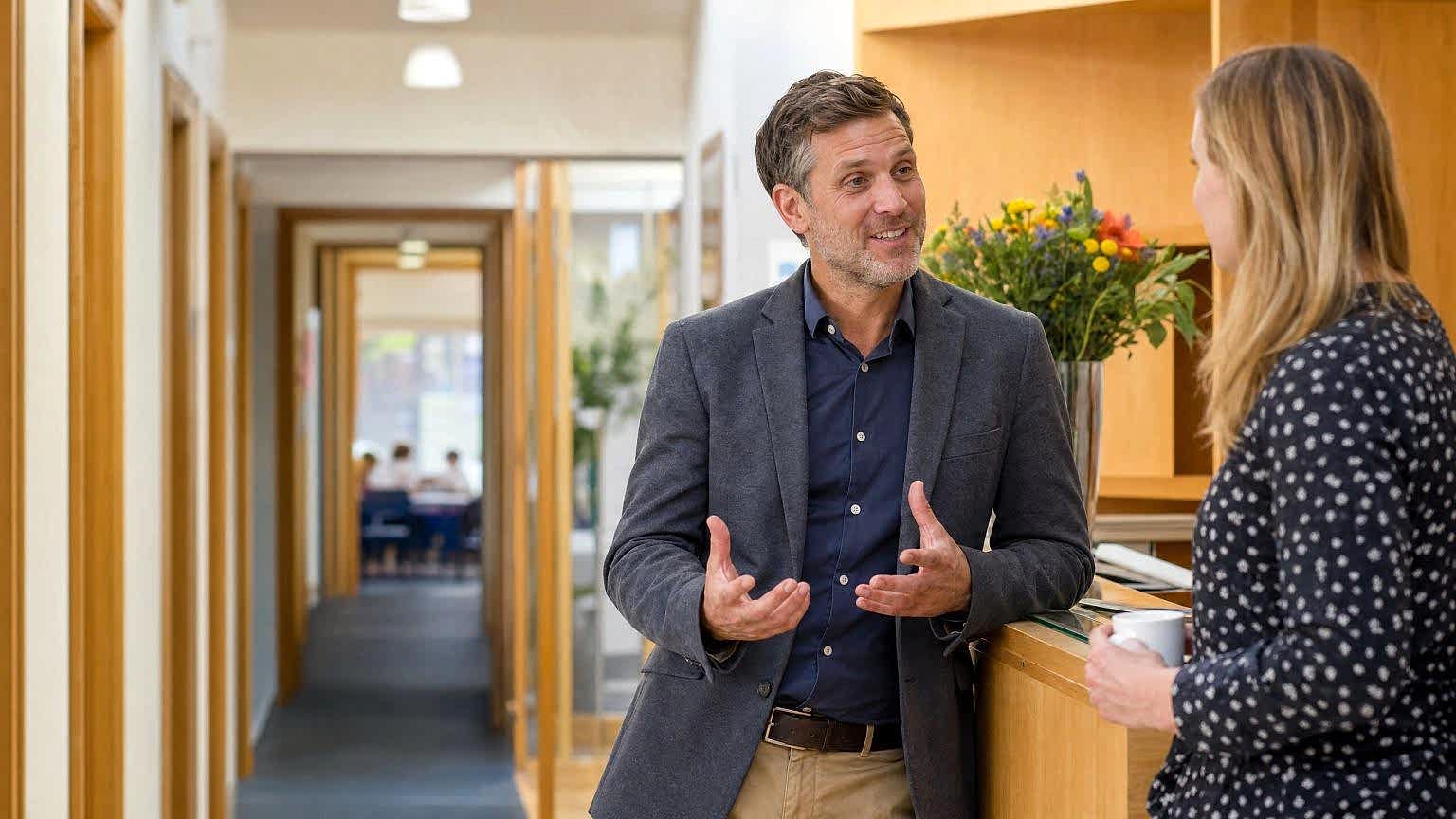 Staff talking in the corridor of an English language school